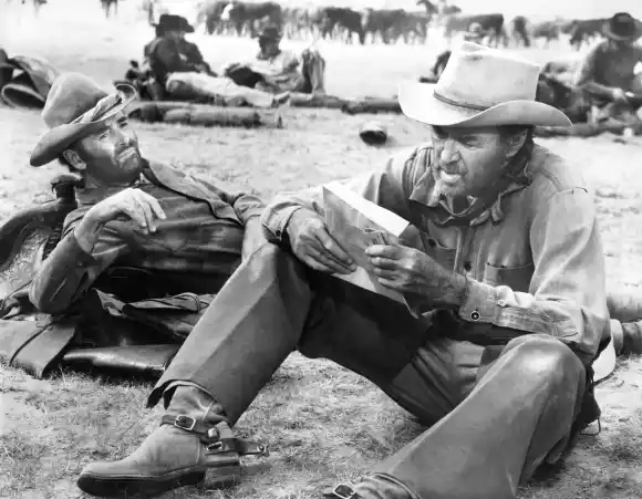 January 9, 2024, USA: Henry Fonda, James Stewart, on-set of the film, The Cheyenne Social Club , National General Pictur