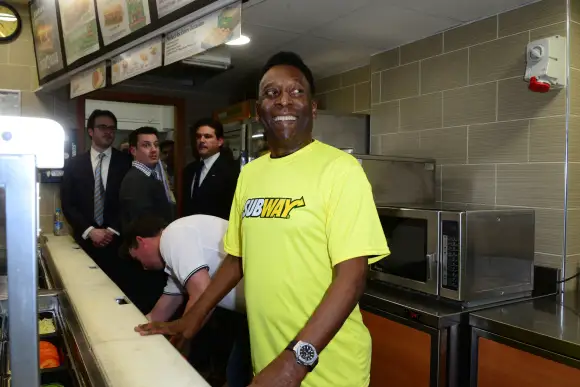 Pelé Subway photocall, London, Britain - 20 March 2015 LONDON, UK, MAR 20: Legendary Brazilian footballer Pele celebrate