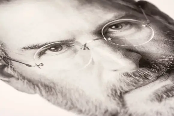 BUCHAREST, ROMANIA - FEBRUARY 20, 2014: Steve Jobs Photo On Steve Jobs Biography Book. Was written at the request of Job
