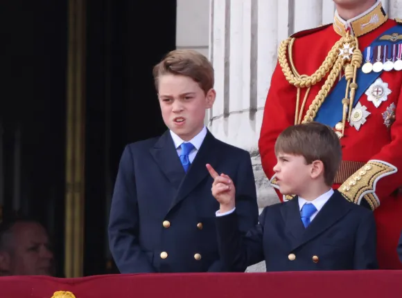 Something grabs Prince Louis attention. The Royal family including King Charles III, Queen Camilla, Prince William The P