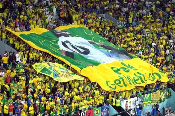 Brazil v South Korea - FIFA World Cup, WM, Weltmeisterschaft, Fussball 2022 - Round of 16 - Stadium 974 A large flag fea