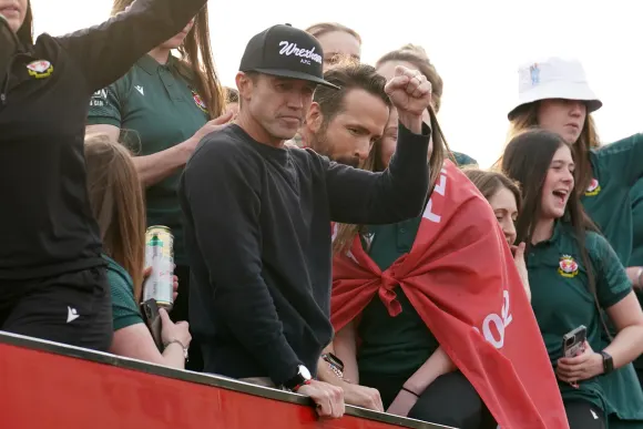 Wrexham Victory Parade Wrexham Co-Owners, Rob McElhenney and Ryan Reynolds (right) celebrate during a victory parade in