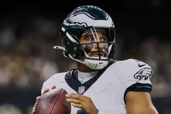October 3, 2024, New Orleans, Louisiana, U.S: Philadelphia Eagles quarterback Jalen Hurts looks to pass the ball again t