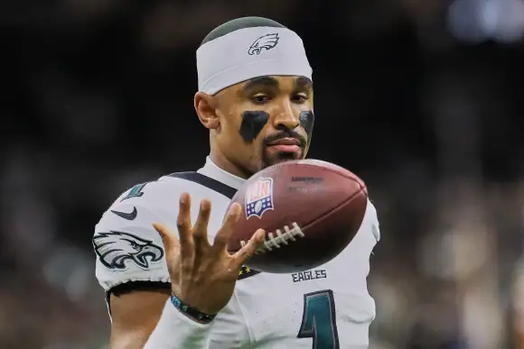October 3, 2024, New Orleans, Louisiana, U.S: Philadelphia Eagles quarterback Jalen Hurts warms up before his game again