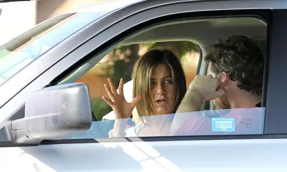 Jennifer Aniston and Sam Worthington in 'Cake'