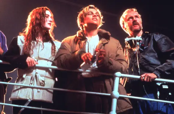 James Cameron, Leonardo DiCaprio and Kate Winslet on the set of "Titanic"