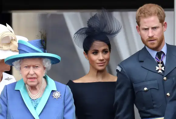 Queen Elizabeth II, Duchess Meghan, and Prince Harry in 2018