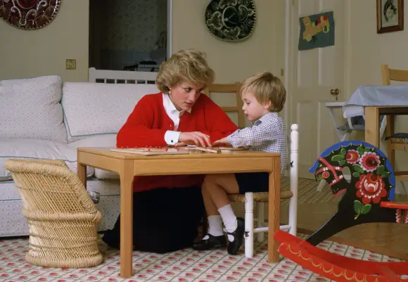 Lady Diana and Prince William in the playroom at Kensington Palace