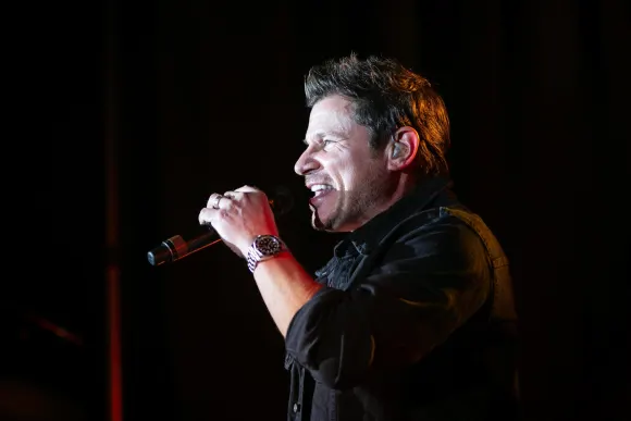 Syndication: The Enquirer, Nick Lachey performs with the band 98 Degrees, in front of a sold-out crowd at the Hard Rock