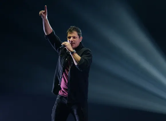 HOLLYWOOD FL - JANUARY 22: Nick Lachey of 98 Degrees performs at Hard Rock Live held at the Seminole Hard Rock Hotel & C