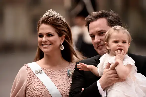 La princesse Madeleine de Suède, Christopher O'Neill et la princesse Leonore assistent au mariage royal du prince Carl Philip de Suède et de Sofia Hellqvist, le 13 juin 2015.