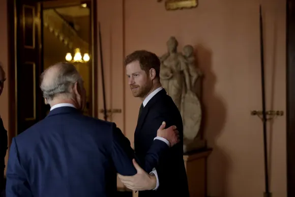 Prince Charles Prince Harry crooning arm in arm, British Royals, International Year of the Reef, London