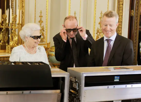 Queen Elizabeth II watching her Christmas broadcast in 3D in 2012.