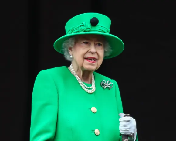 Queen Elizabeth II, accompanied by The Prince of Wales and The Duchess of Cornwall, The Duke and Duchess of Cambridge