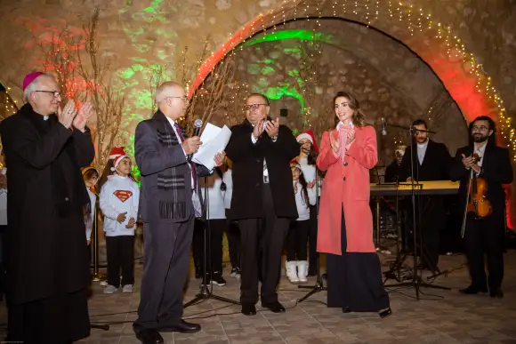 Queen Rania of Jordan takes part in the lighting of the Christmas tree, December 16, 2018.
