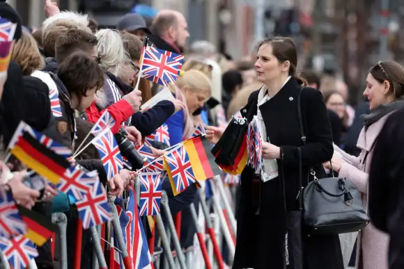 Royal fans wait at the Brandenburg Gate in Berlin