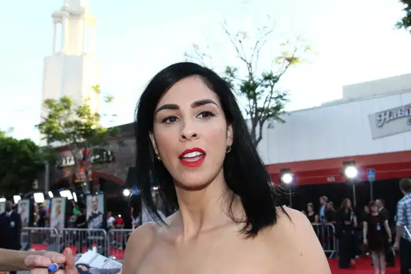 Michael Sheen and Sarah Silverman arrive at the Los Angeles premiere of A Million Ways To Die In The West at Regency Vil