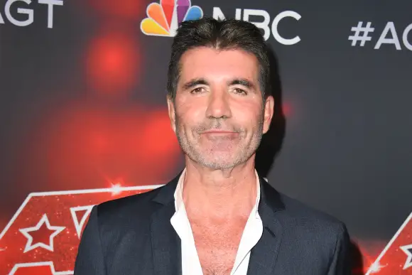 Oh No! Simon Cowell Injures Himself On Electric Bike Again