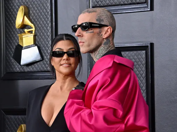Kourtney Kardashian and Travis Barker arrive for the 64th annual Grammy Awards at the MGM Grand Garden Arena in Las Veg